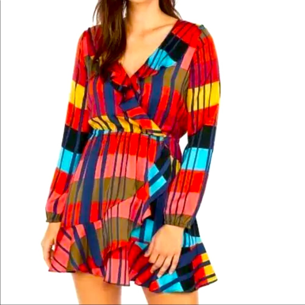 Express color block dress in bright, vibrant hues.